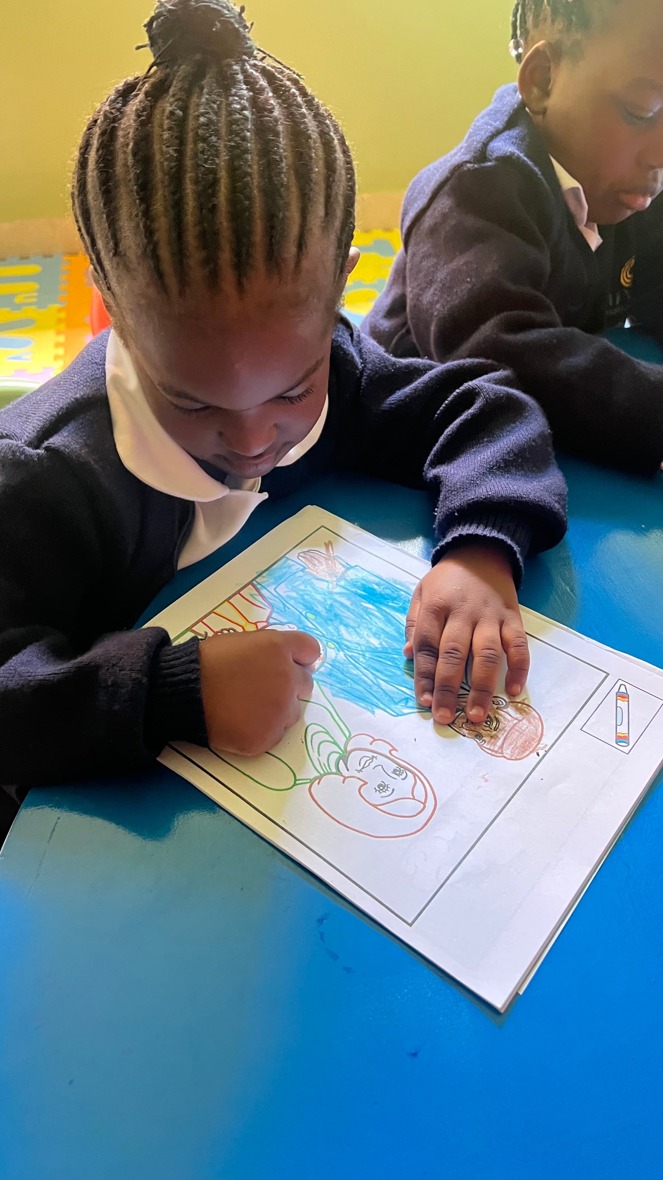 Children laughing and learning together at Carezza International School